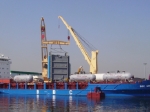 The first of the 2 x 270ton Macchi Boiler being loaded on vessel Hatch covers.