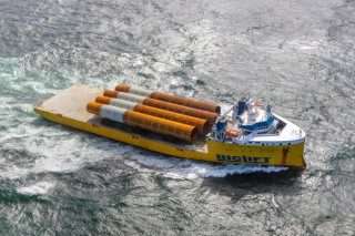 image: Biglift vessel transporting monopiles